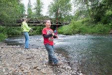 Marcus Larson/News-Register
Grayson Goings and his mother, Courtney, enjoy a day of fishing at Willamina Creek in Blackwell Park. Several of the county parks have water access.